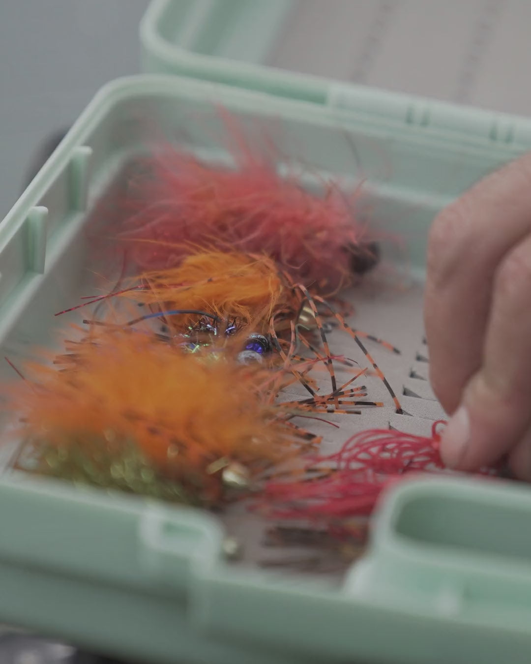 Fly box opening and being loaded with flies