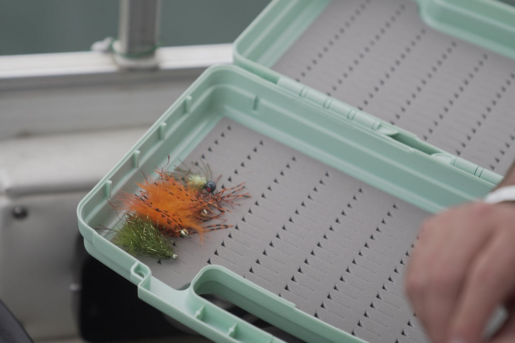Open SLOW fly box with slotted foam and streamers